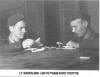 Lt. Baber and Len Putnam at photo lab at Stalag Luft I